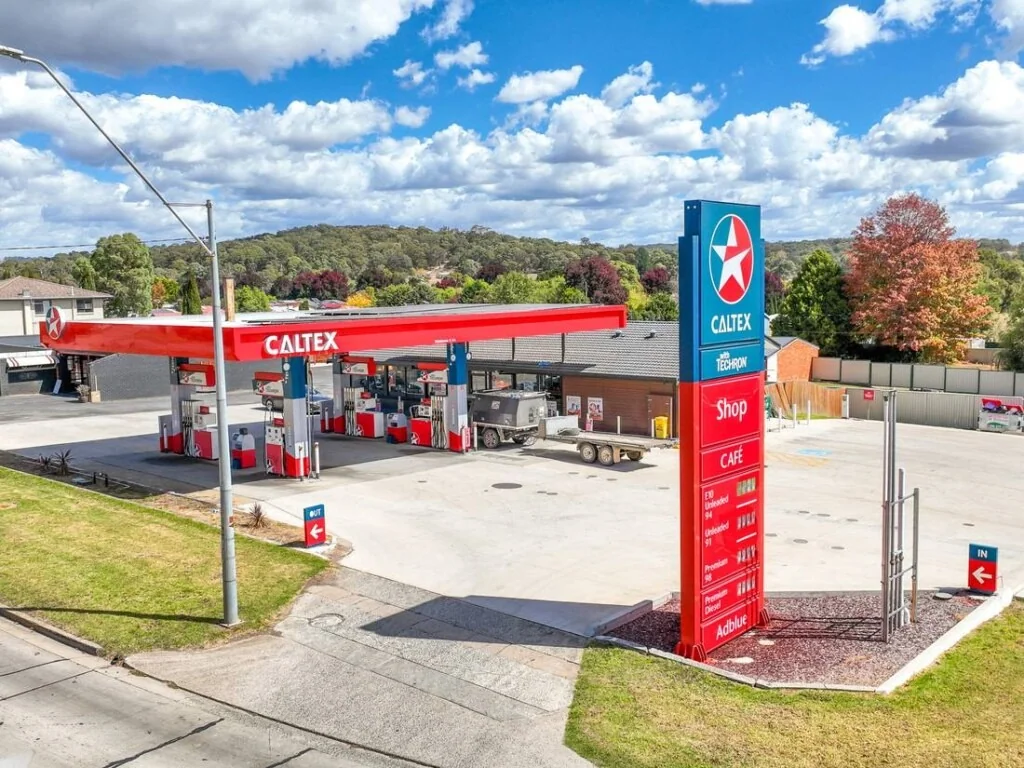Costco petrol forecourt with pumps closed and a handwritten NO FUEL sign
