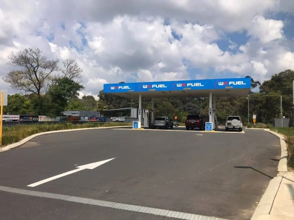 Regional petrol station forecourt with fuel pumps and convenience store in western Victoria