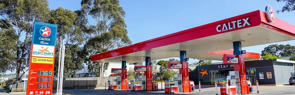 Caltex petrol station in Sunbury with red canopy, fuel pumps, and star mart convenience store